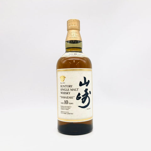 サントリー 山崎 10年ホワイトラベル 700ml。今では希少な終売品で、爽やかでフルーティーな香りとバランスの良い味わいが特徴のシングルモルトウイスキー。金色の響マーク