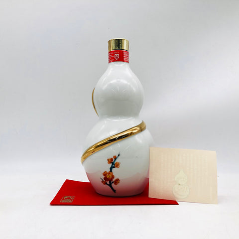 「サントリー ローヤル 巳歳ボトル（2025年限定陶器ボトル）、43％、蛇と四季の花柄のデザイン、重厚なローヤルの甘味と樽香」