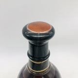 ワイルドターキー1855リザーブ750ml。濃厚なキャラメルとオーク香が特徴のプレミアムバーボンで、深い琥珀色と重厚な味わいの限定ボトル。112.2°(56.1%)
