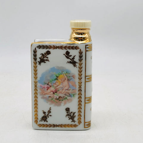 カミュブック紳士と淑女　ホワイト ミニチュアボトル50ml。小さなボトルに宿る、気品と香りの芸術。 