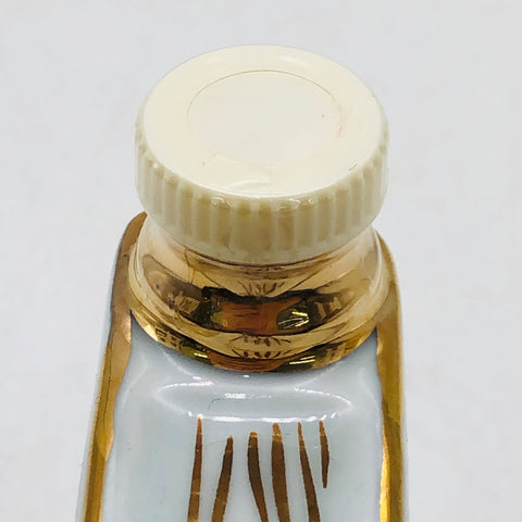 カミュブック紳士と淑女　ホワイト ミニチュアボトル50ml。小さなボトルに宿る、気品と香りの芸術。 