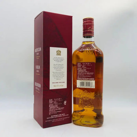 ダルモアウイスキーとバーガンディ色のギフトボックスの画像